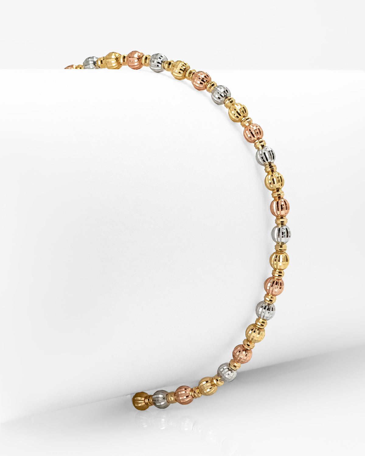 Pulsera Esferas Diamantadas en Tres Oros