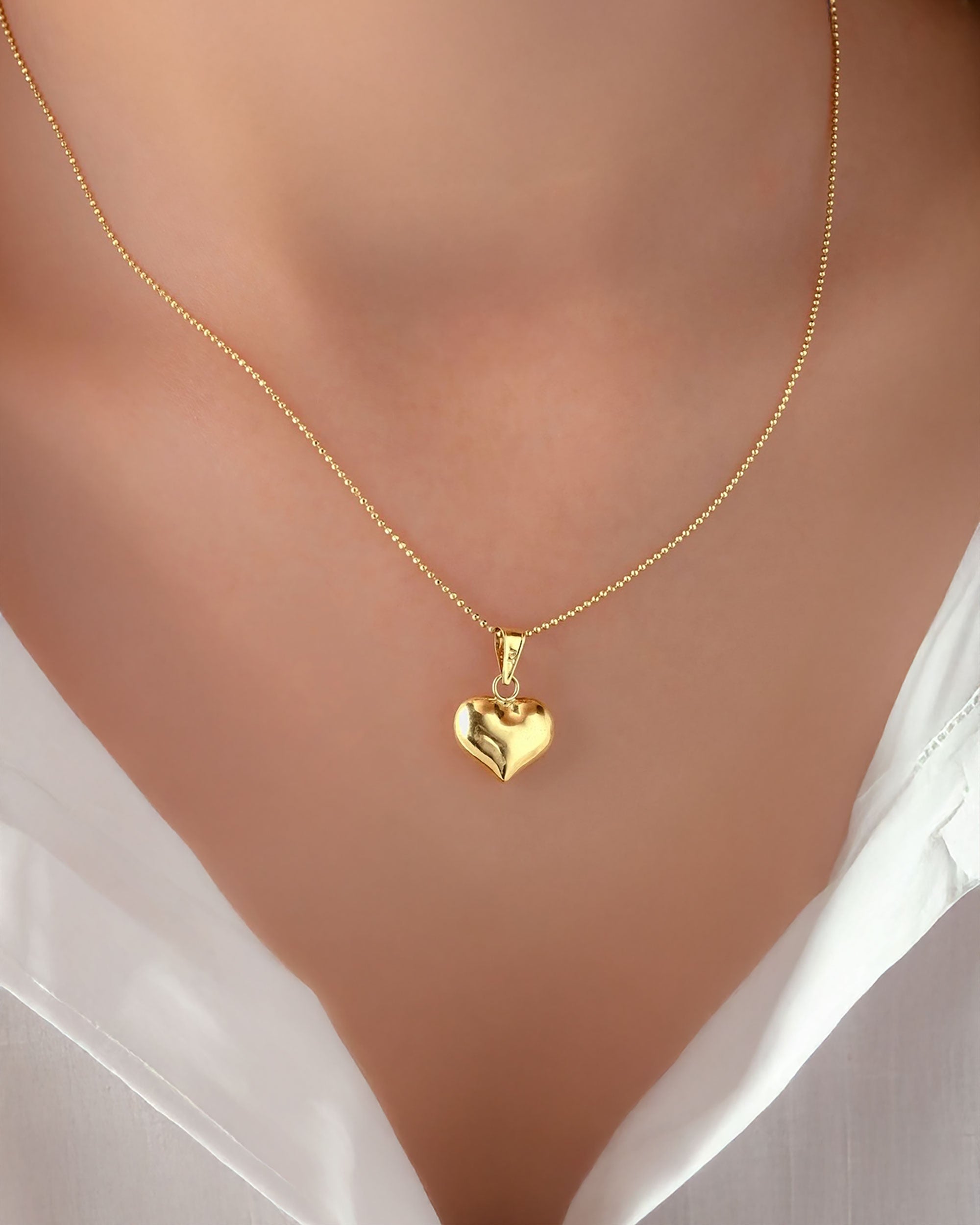 Dije Latido de Oro